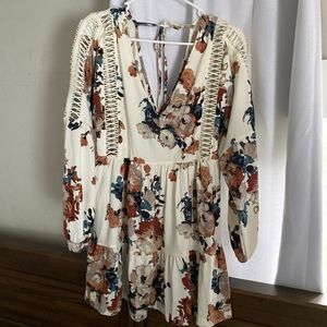 Floral blouse with cutouts around arms (runs big)